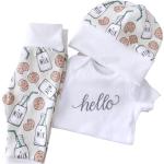Bonnets en mailles blancs cassés en coton bio éco-responsable pour bébé de la boutique en ligne Etsy.com 