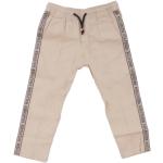 Pantalons Tommy Hilfiger beiges en coton Taille 7 ans pour garçon de la boutique en ligne Miinto.fr avec livraison gratuite 