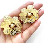 Boucles d'oreilles à clip dorées à strass à motif fleurs look vintage 